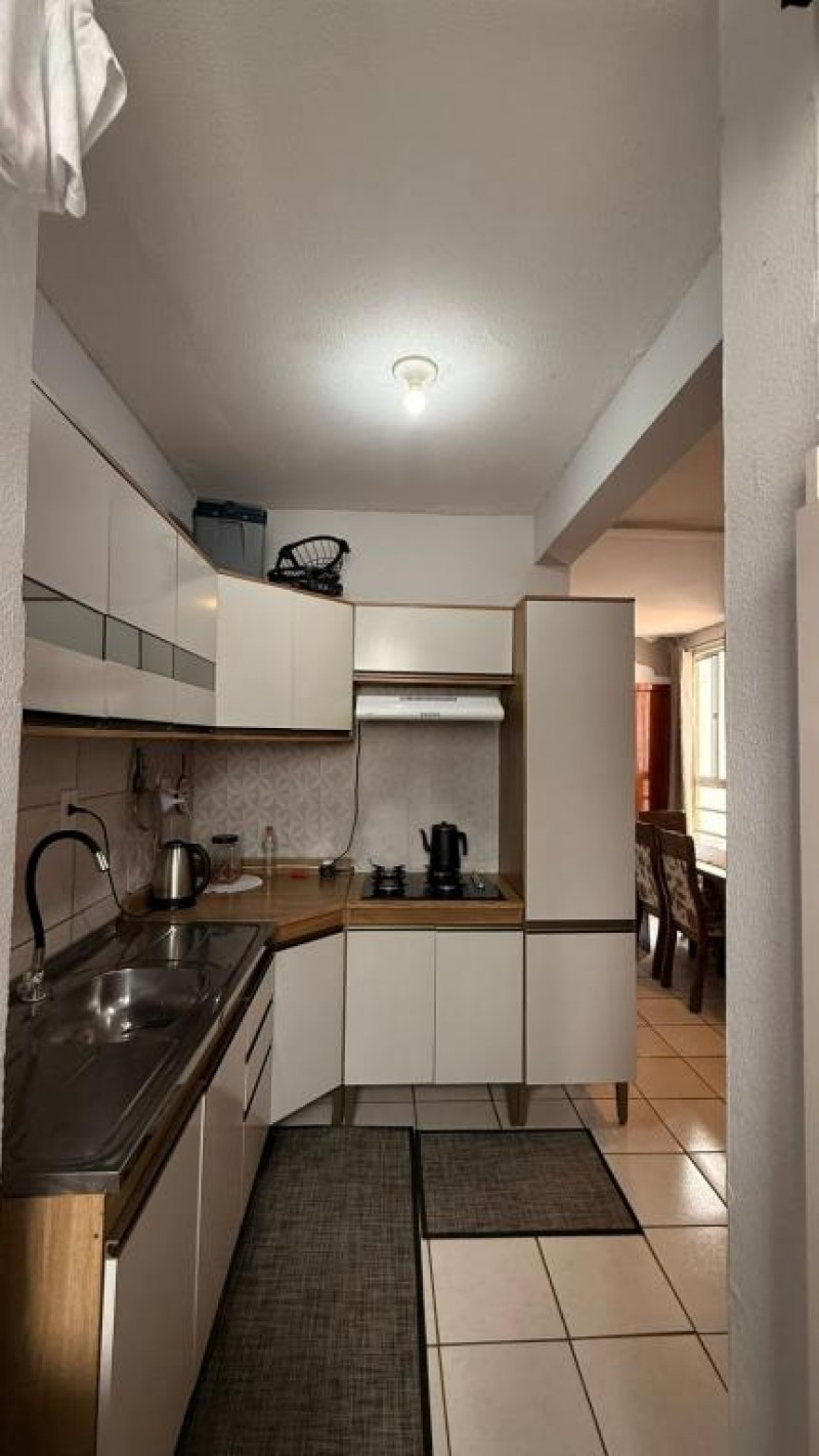 APARTAMENTO EM CONDOMÍNIO